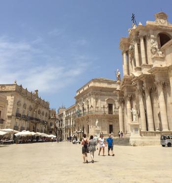 In the main city square of Siracusa, the Cathedral sits beside the Artemision, now a museum. Photo by Fred Steinberg 